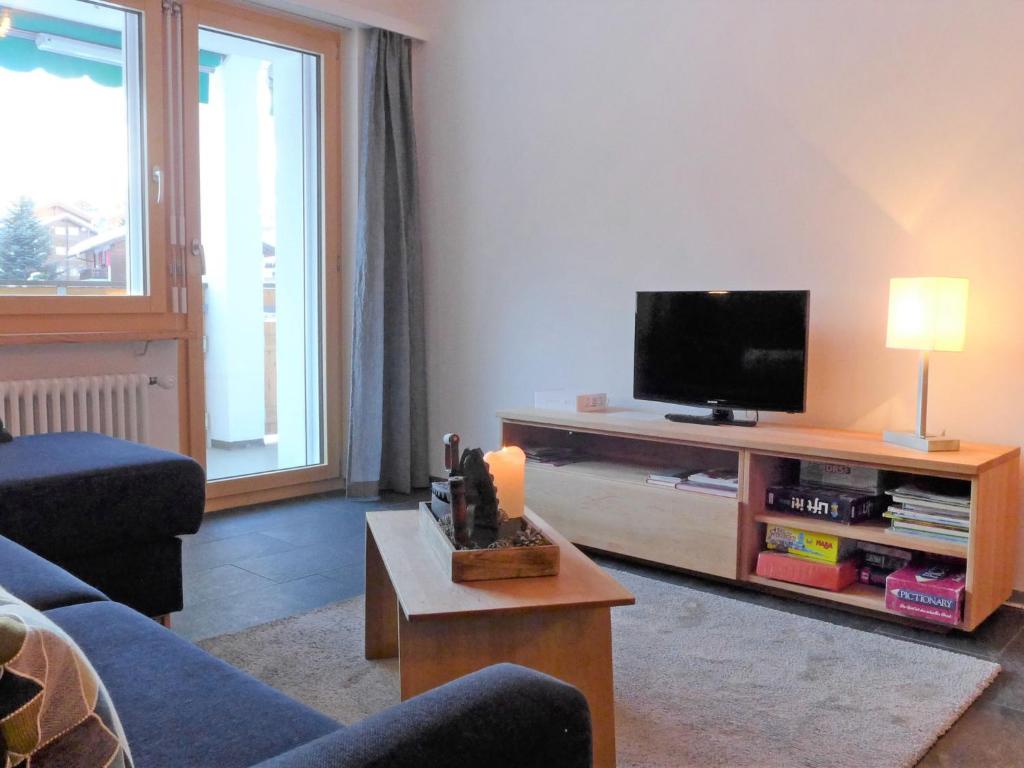 TV a/nebo společenská místnost v ubytování Apartment Fis by Interhome