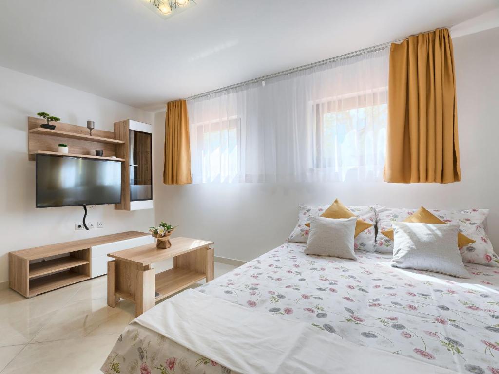 Łóżko lub łóżka w pokoju w obiekcie Apartment Meden by Interhome