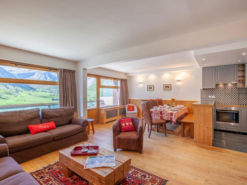 a living room with a couch and a table at Apartment Le Shamrock by Interhome in Tignes