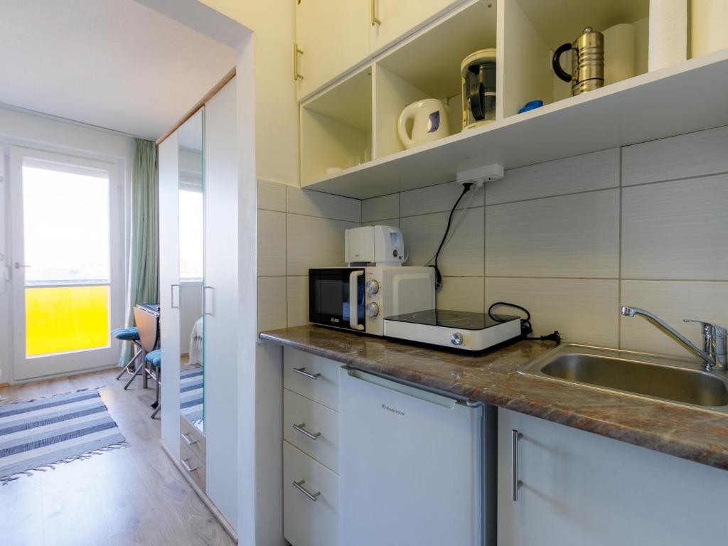 Kuchyňa alebo kuchynka v ubytovaní Studio Golden Gate by Interhome