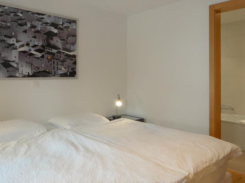 Postel nebo postele na pokoji v ubytování Apartment Shangri La by Interhome