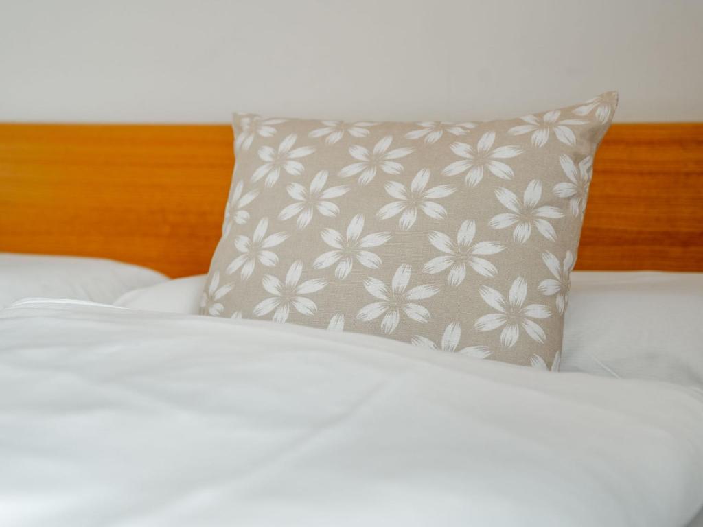 A bed or beds in a room at Apartment Appartement 3 by Interhome