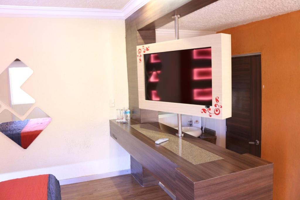 TV a/nebo společenská místnost v ubytování Motel Primavera