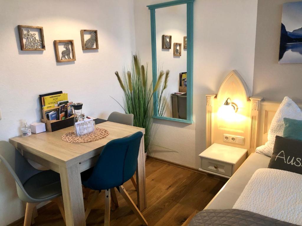 Postel nebo postele na pokoji v ubytování Apartment Goisernperle
