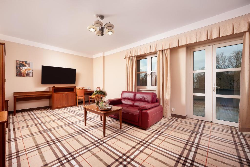 TV a/nebo společenská místnost v ubytování Hotel Anton by DNS