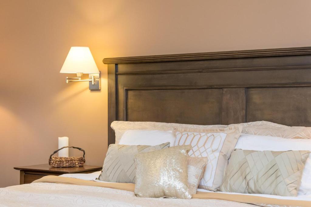 Un pat sau paturi într-o cameră la New Gorgeous Sidney Miraloma