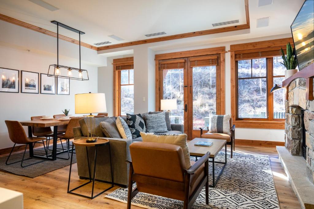 a living room with a couch and a table at NEW LISTING! Luxury Northstar Village Residence - Big Horn 210 in Truckee