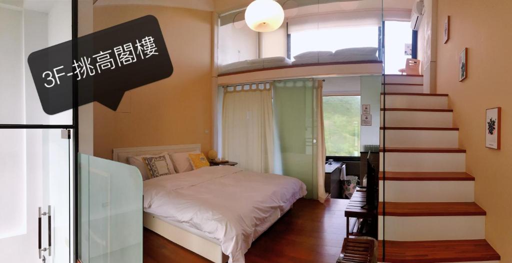 Postel nebo postele na pokoji v ubytování 礁溪好好沐溫泉MoonVilla具電動車充電樁