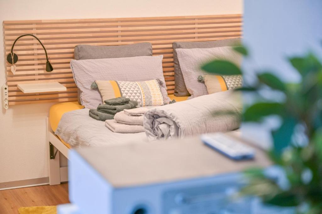 Letto o letti in una camera di Ambassador Yellow Home