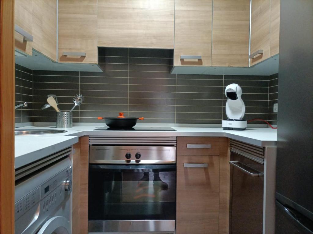 Kuchyň nebo kuchyňský kout v ubytování Relájate en Ramales de la Victoria, apartamento con piscina y parking