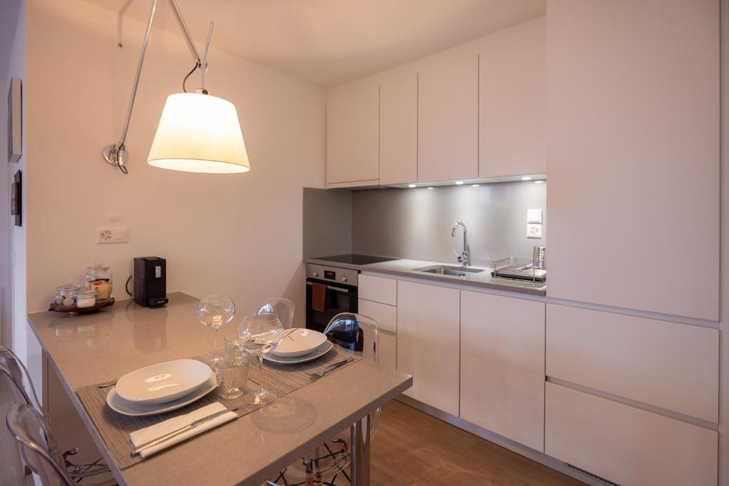 Kuchyň nebo kuchyňský kout v ubytování Casa Alice Ascona, appartamento di vacanza.