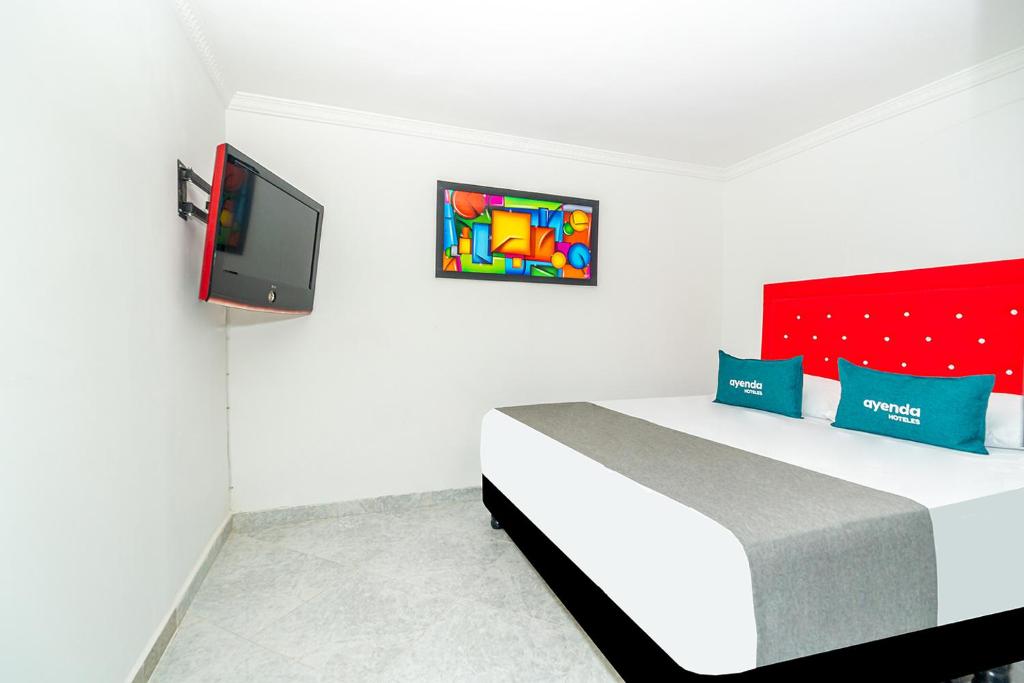 TV a/nebo společenská místnost v ubytování Ayenda Casa San Pablo