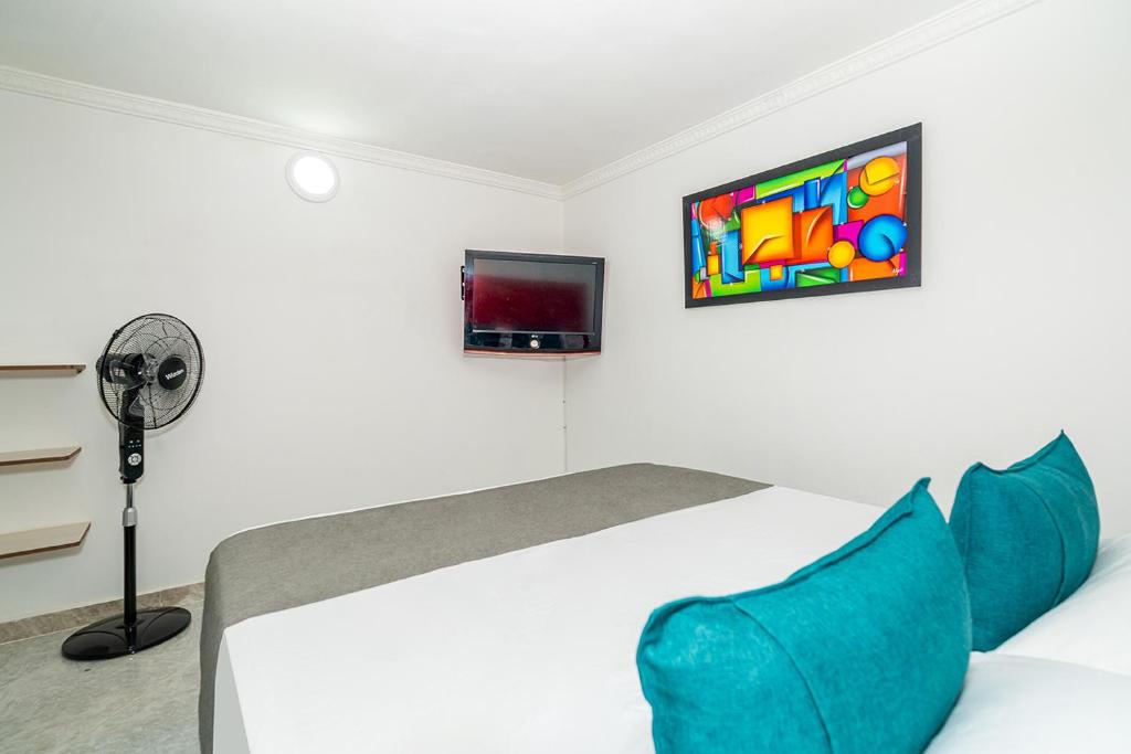 TV a/nebo společenská místnost v ubytování Ayenda Casa San Pablo