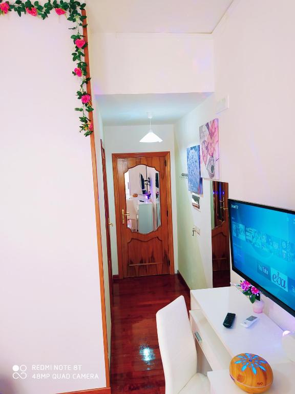 Telewizja i/lub zestaw kina domowego w obiekcie Altea Royale