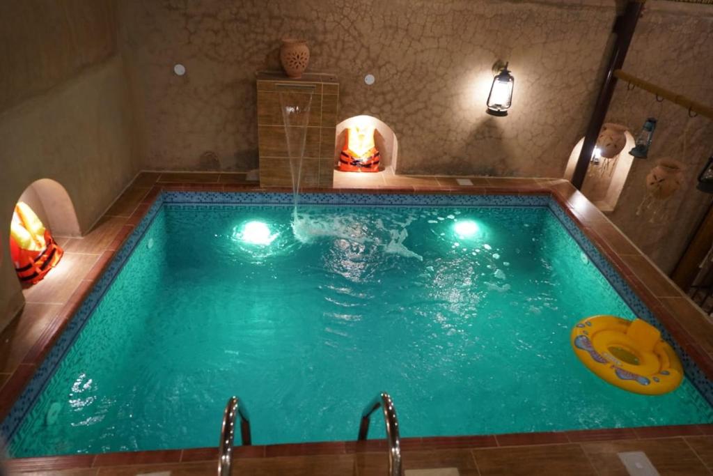 Bazén v ubytování نزل مزارعة التراثية mazarah heritage inn nebo v jeho okolí
