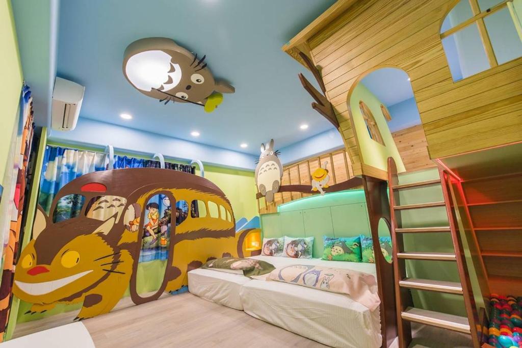 Postel nebo postele na pokoji v ubytování Kids Fun B&B