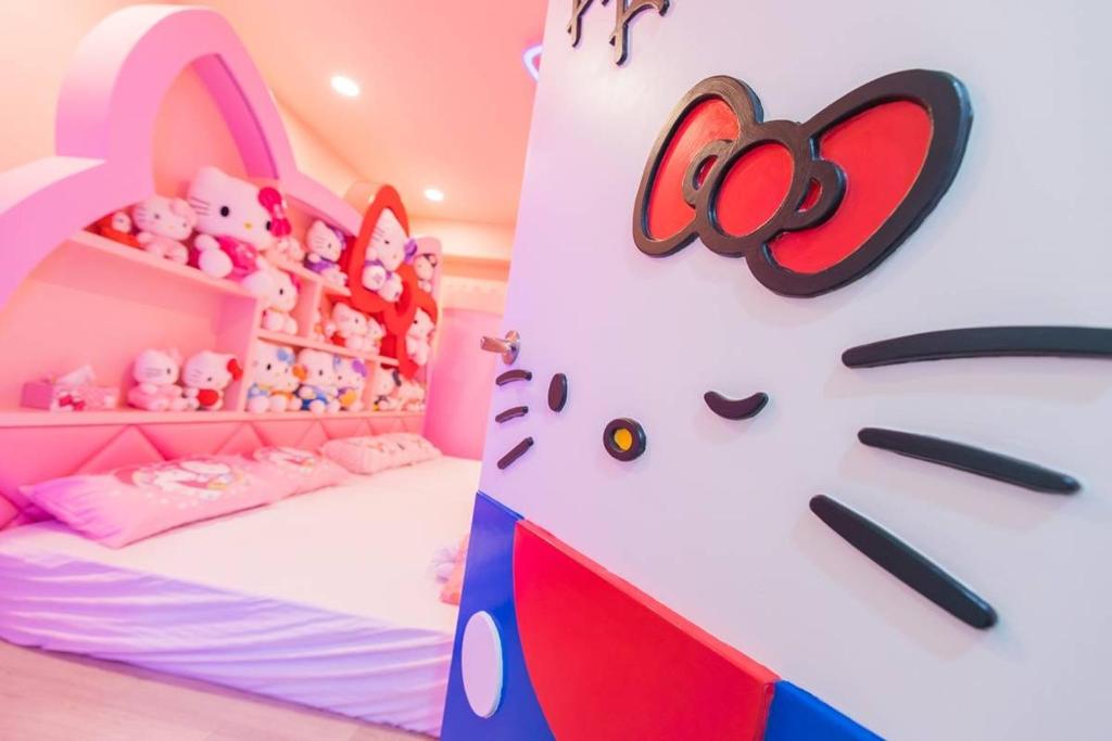 Postel nebo postele na pokoji v ubytování Kids Fun B&B
