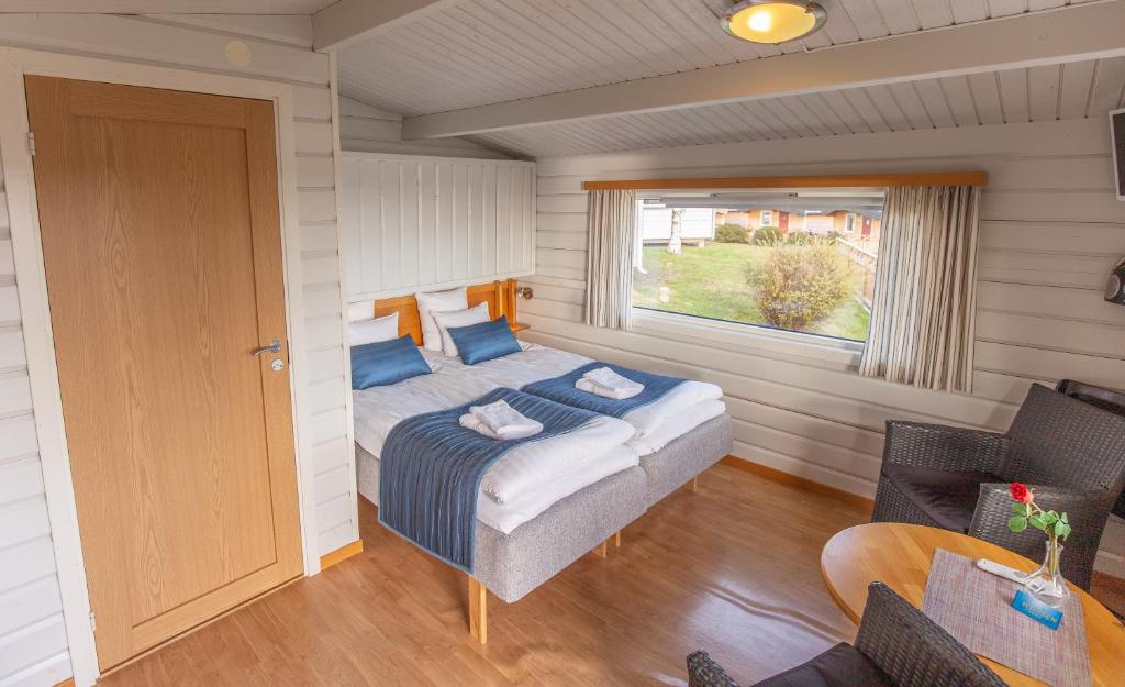 Postel nebo postele na pokoji v ubytování Hafsten Resort