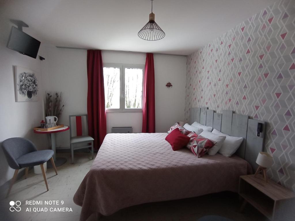 Postel nebo postele na pokoji v ubytování hotel l'échappée d'oléron