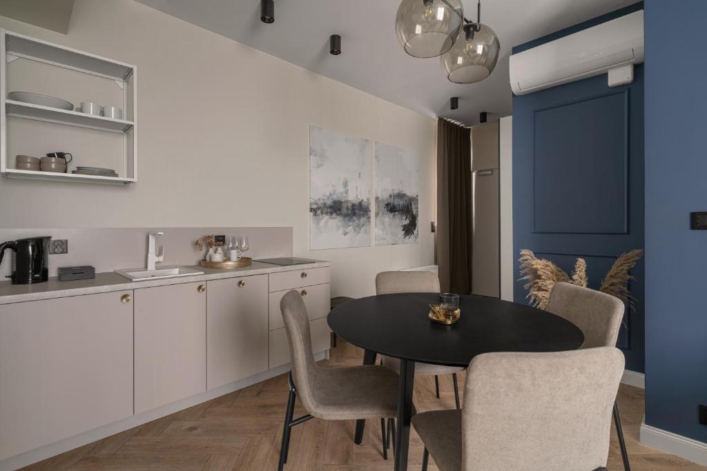 Kuchyňa alebo kuchynka v ubytovaní APARTIO ROOMS Katowice
