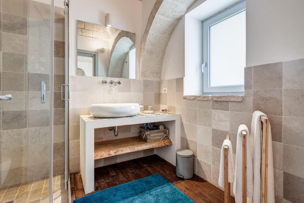A bathroom at Trulli Gianpaolo - Luxury Villa