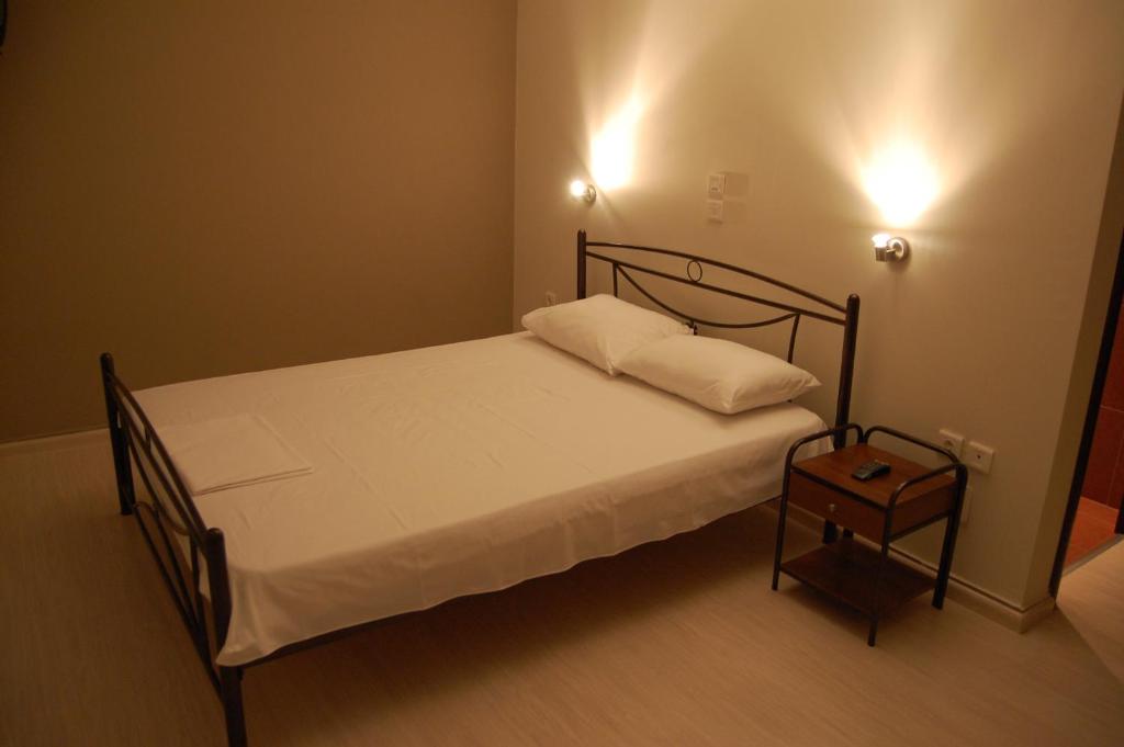 Postel nebo postele na pokoji v ubytování Hotel Antirriο