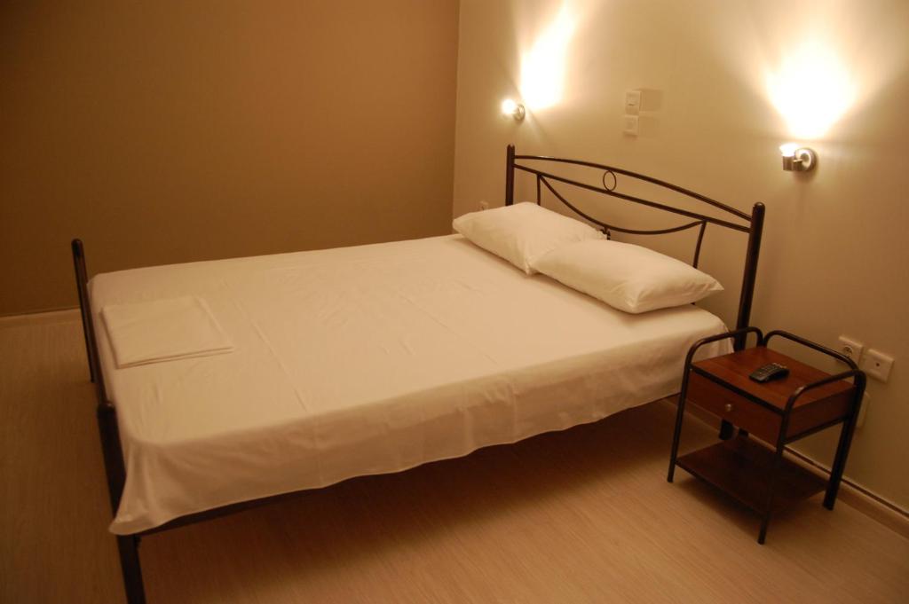Postel nebo postele na pokoji v ubytování Hotel Antirriο