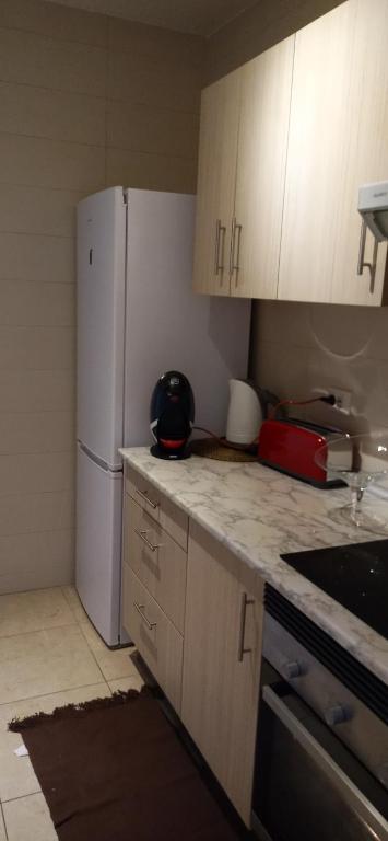 Kuchyň nebo kuchyňský kout v ubytování City apartment