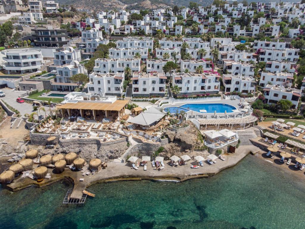 an aerial view of a resort with a swimming pool at YAZ Yalıkavak in Yalıkavak