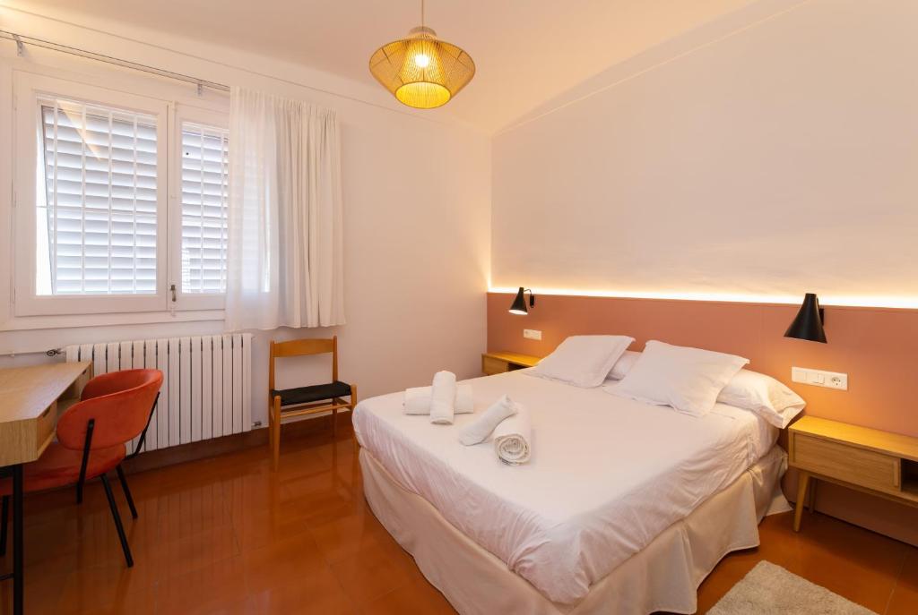 Postel nebo postele na pokoji v ubytování Villa Can Bagués