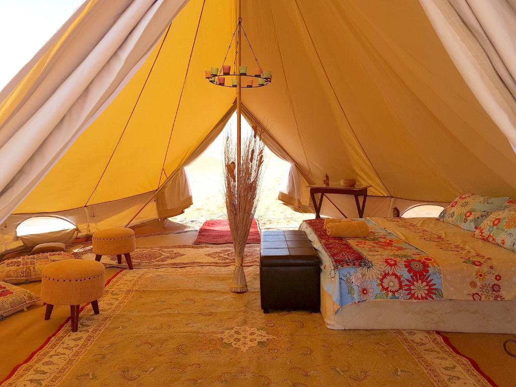 Voodi või voodid majutusasutuse Starwatching Private Camp toas