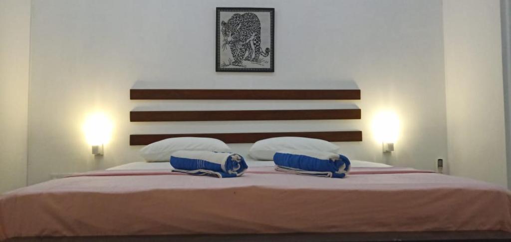 Postel nebo postele na pokoji v ubytování Petit Guest House