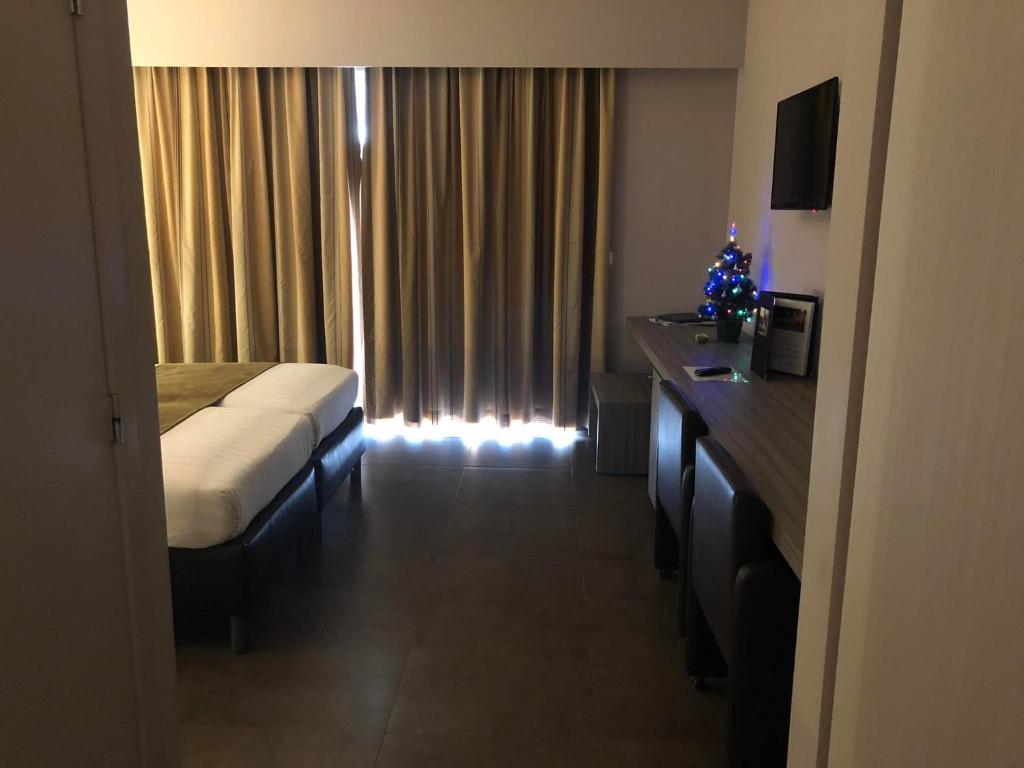 Postel nebo postele na pokoji v ubytování Hotel Gemeente Huis