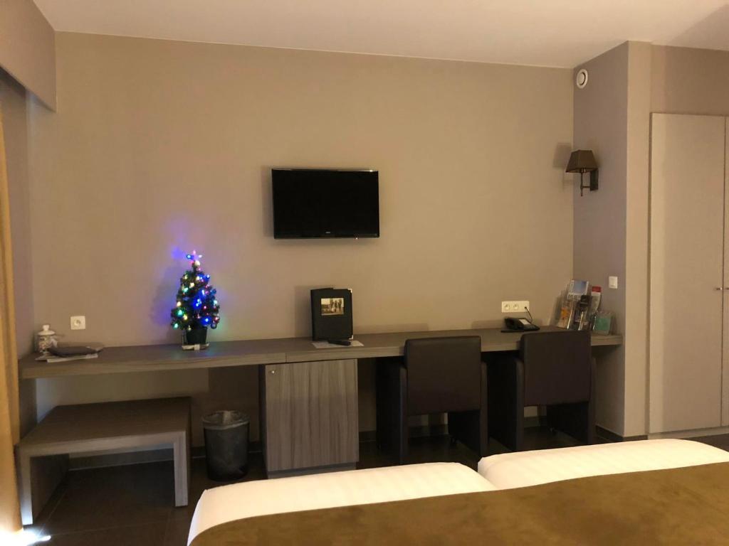 TV a/nebo společenská místnost v ubytování Hotel Gemeente Huis