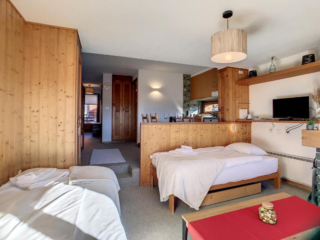 Postel nebo postele na pokoji v ubytování Residence Emeraude