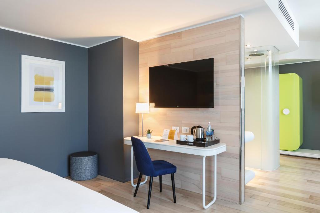 Ліжко або ліжка в номері voco Milan-Fiere by IHG