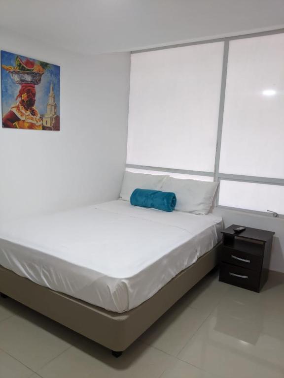 Postel nebo postele na pokoji v ubytování Hotel ITACO