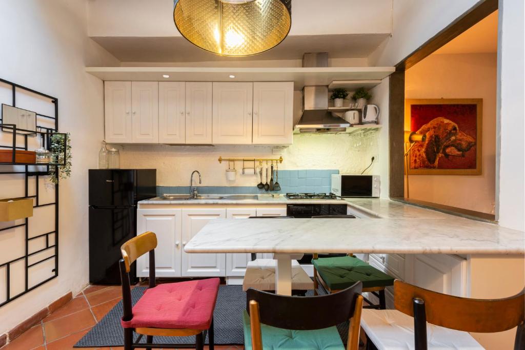 A kitchen or kitchenette at Canacci by Mmega