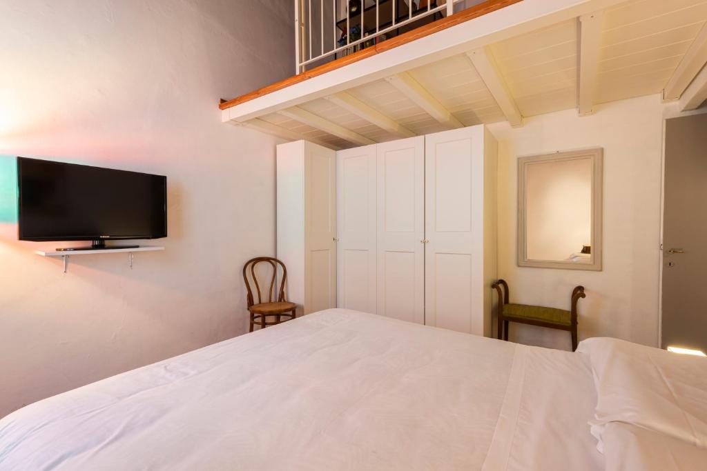 A bed or beds in a room at Canacci by Mmega