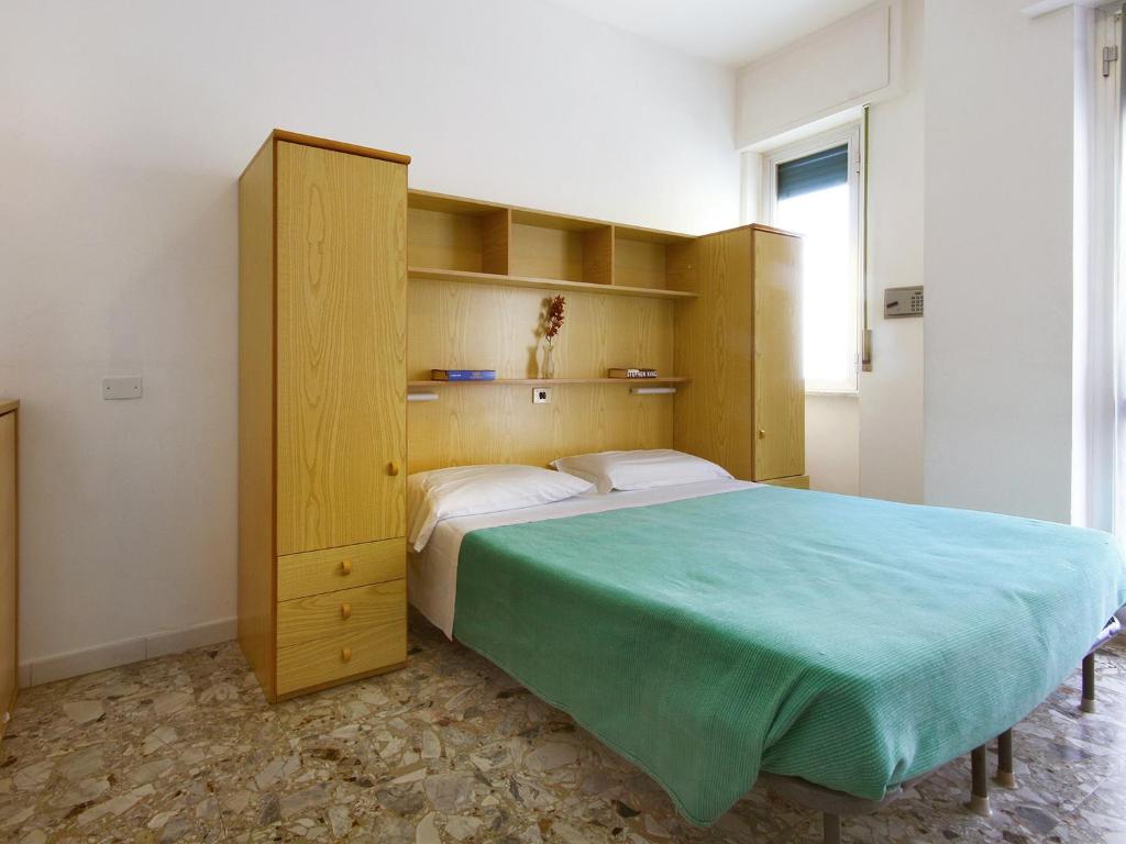 Posteľ alebo postele v izbe v ubytovaní Albergo Anita
