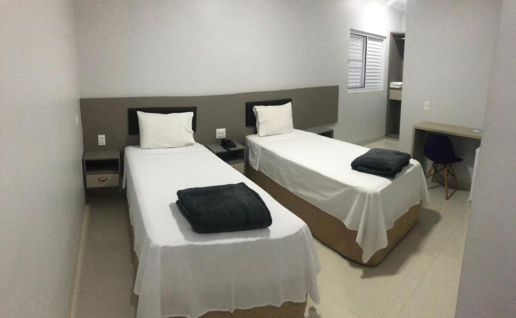 Cama ou camas em um quarto em Hotel Uipi