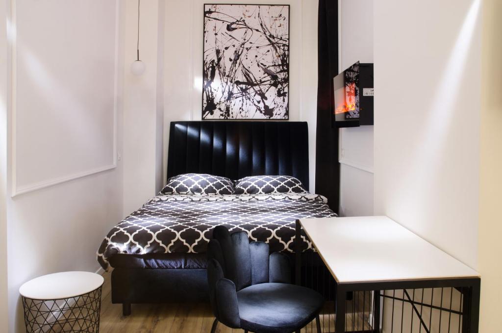 Posteľ alebo postele v izbe v ubytovaní Main Square Luxury Apartment