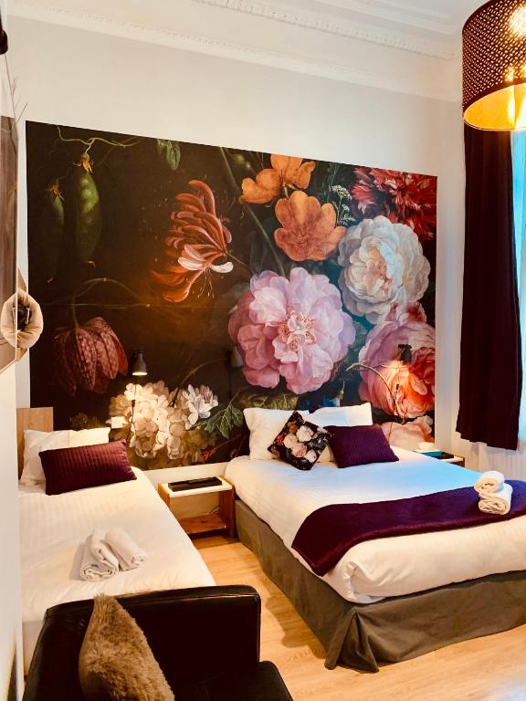 Postel nebo postele na pokoji v ubytování Hotel Du Parlement