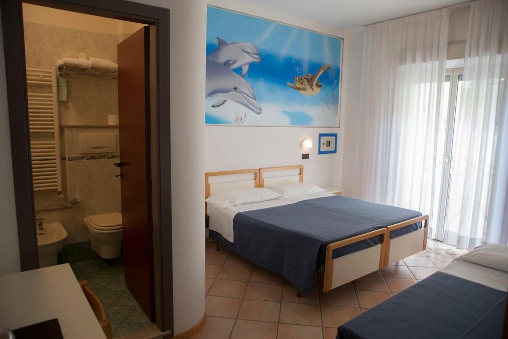 Hotel Vanni - Quarto Quádruplo Conforto