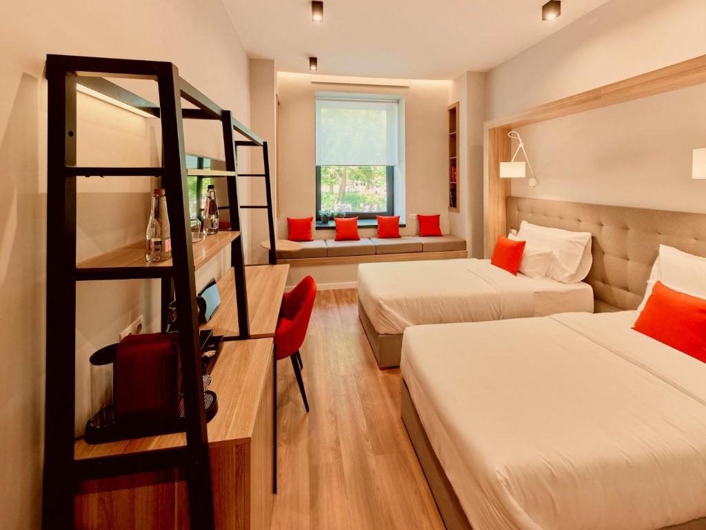Postel nebo postele na pokoji v ubytování Up Hotel Budapest