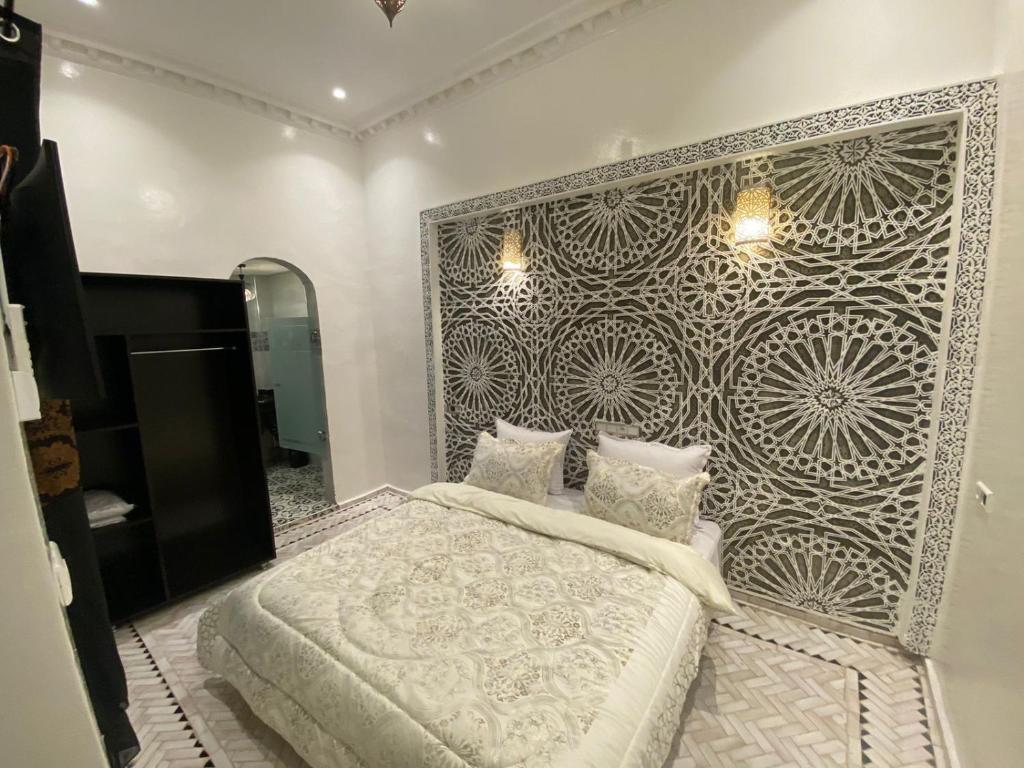 Letto o letti in una camera di Riad Zyna