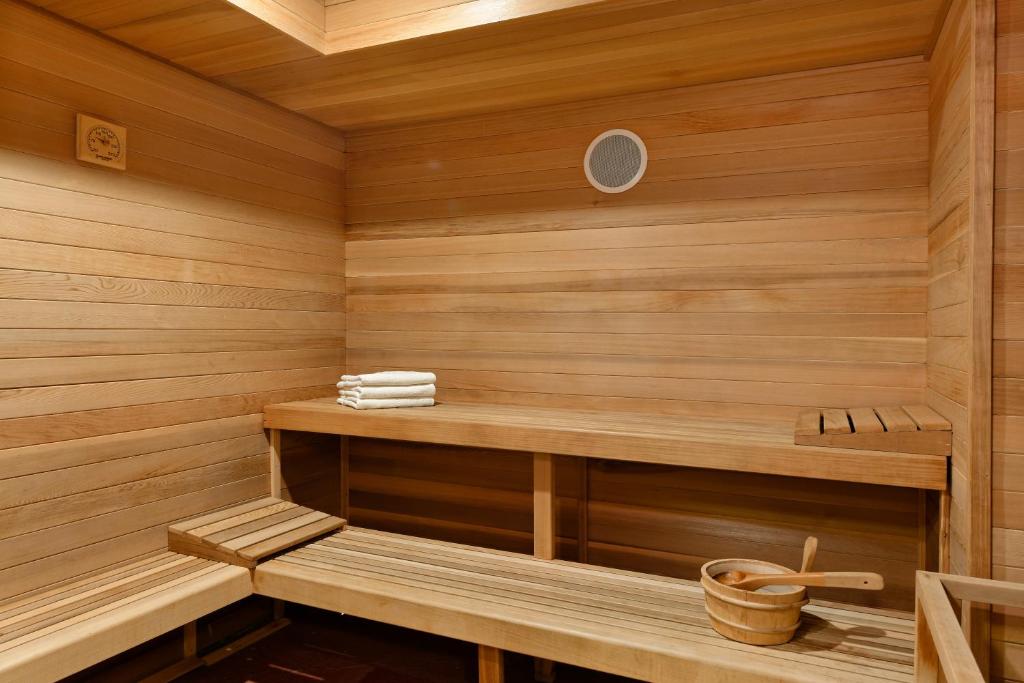a wooden sauna with a wooden bench in it at Standard Two Bedroom - Aspen Alps #402 in Aspen