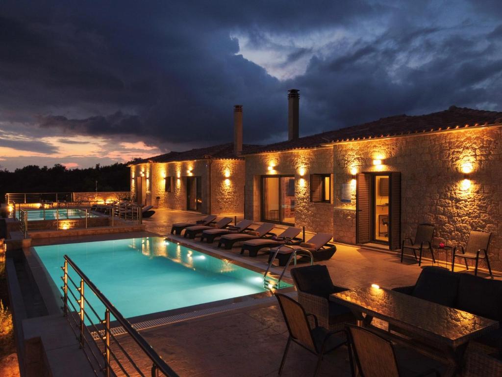 Bazén v ubytovaní Manazil Mani - Luxury Villas alebo v jeho blízkosti