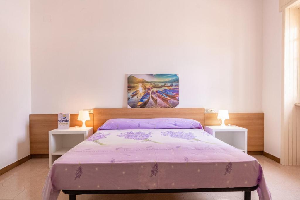 Łóżko lub łóżka w pokoju w obiekcie VILLA ISCHIA