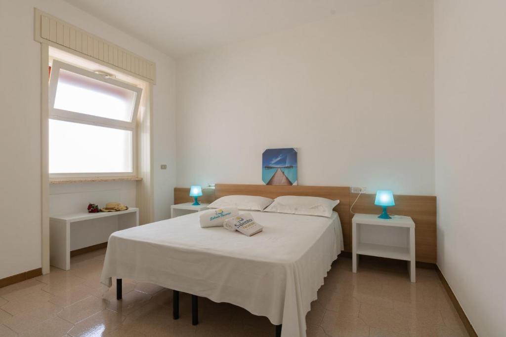 Łóżko lub łóżka w pokoju w obiekcie VILLA ISCHIA